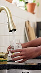 Home, hands and woman with tap water in glass for hydration, thirst and natural nutrients. Kitchen, person and pour liquid at faucet for refreshing drink, fresh beverage and body detox for wellness