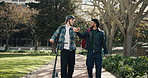Friends walking, students and fist bump at university for support, success or thank you with team. Happy men, college and hand gesture for education achievement, learning or goal with scooter outdoor