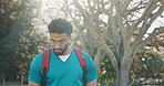 Medical, student and phone with man on campus for learning schedule, doctor residency and college. Healthcare internship, contact and medicine program with person in university for text message