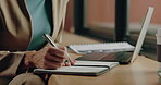Notebook, writing and hands of person for article, freelancer schedule or research in cafe. Copywriter, draft and laptop for project report with remote work for media agency, web magazine or planning