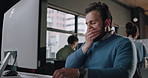 Business, yawning and man with computer, tired and copywriting with burnout, overworked and brain fog. Person, employee and journalist in workplace, pc and exhausted with deadline, research or sleepy
