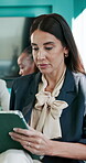 Business, woman and reading on tablet in office for accounting, financial report and research. Female person, meeting and digital for schedule update, review budget and investment feedback of company