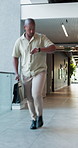Running, urgency and watch with business black man in workplace hallway for delay or rushing. Hurry, late and time with fast employee person in corridor of office for appointment, meeting or schedule