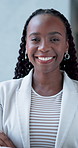 Smile, arms crossed and face of black woman in office for confidence, real estate broker and about us. Portrait, business property agent and laugh with opportunity in agency as commercial developer