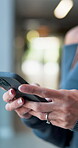 Texting, employee and hands with smartphone, office and chatting with contact for story and creative. Typing, message or person with tech to schedule meeting, journalist and communication with source