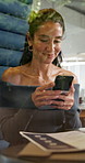 Business, woman and phone in office booth for client email, portfolio management or finance planning. Hybrid work, financial advisor and tech in pod for market monitoring and compare investment data