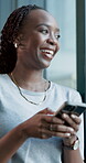 Woman, laughing and texting with smartphone, office and communication with contact on web and break. Happy, employee and black person with mobile for chat, reading and funny joke on message or online