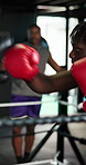 Fitness, kickboxing and men in gym for training, technique or cardio workout with partnership. Sports, gloves and male athlete with coach for exercise, challenge or performance for self defense.