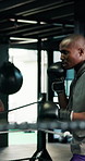 Sports, kickboxing and men in gym for training, technique or cardio workout with partnership. Fitness, gloves and male athlete with coach for exercise, challenge or performance for self defense.