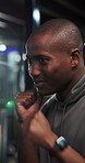 Boxing, fitness and black man in gym for workout, training or MMA challenge with power. African person, boxer and punch for combat sports, fight practice and martial arts exercise for self defense