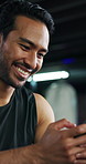 Phone, happy and man in gym for boxing training with networking, social media or communication. Fitness, practice and male athlete with cellphone for online texting on mobile app in sports center.