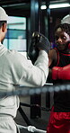 Boxing ring, partner and fitness with men in gym for combat sports, martial arts and personal trainer workout. Self defense exercise, mma training and punch with people in club for coaching and fight