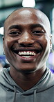 Face, fitness and funny with black man in gym for development or workout as personal trainer. Exercise, laughing and smile of happy African coach in health club for improvement, progress or training