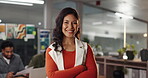 Face, confident and woman with arms crossed in office, happy or career growth for reporter in media. Creative, journalist and person with smile for ambition in newsroom, press or employee in New York
