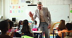 High five, support and man in classroom, students and success with knowledge, growth and learning. Teacher, group and kids in school, achievement and child development with education and motivation