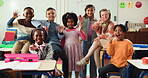 Face, children and group in classroom, waving or excited for education in school, smile or learning. Morning, hello and students in elementary, growth and development of kids, happy and knowledge