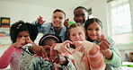 Heart hands, face and children in classroom at school in morning for friendship, bonding or learning. Happy, group and portrait of kid students with love emoji for education, growth and development.