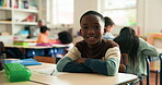 Face, student and child with arms crossed, classroom or happy for education, growth and development. Writing, assignment and pride for knowledge in elementary school, black kid and boy with smile