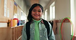 Happy, backpack and face of kid at school with confidence for education, learning or development. Smile, student and portrait of girl child from Mexico with pride for academic growth at campus.