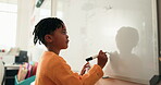 Kid, student and writing on whiteboard in class for lesson, answer to question and problem solving. Black boy, child and drawing shape for demonstration, education activity and solution for knowledge
