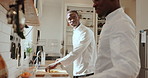 Chef, cooking and men with teamwork in kitchen for gourmet recipe, training and meal prep. Hospitality intern, mentor and black people with help in restaurant for food preparation and culinary skills