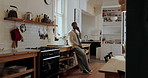 Home, phone call and black man in kitchen, communication and network with digital app for chatting. African person, apartment and mobile user with smartphone, connection and talking with social media