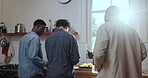 Back, cooking and conversation with friends in kitchen of home together for diet, health or nutrition. Food, meal prep and planning with group of people in apartment for discussion, hunger or reunion