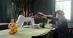 Excited, people and cheers with red wine at restaurant for celebration, dinner party and reunion. Group, friends and toast with alcohol for good news, social gathering and happy hour for fine dining