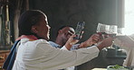 Happy people, wine glass or phone with picture for dining celebration, social media or get together. Group, toast or cheers with alcohol, mobile smartphone or capture moment for memory in restaurant