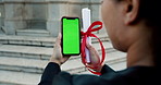 Student, hands and phone with green screen or certificate for graduation or online acceptance. Person, graduate and mobile smartphone display with qualification for scholarship app, results or mockup
