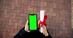 Person, hands or phone with green screen or certificate for graduation or online acceptance. Top view, graduate and mobile smartphone display with qualification for scholarship app, results or mockup