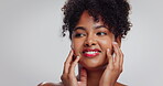 Skincare, smile and afro woman with touch, cosmetics or glowing facial treatment for beauty routine. Happy, self care and African person with space, healthy or smooth skin on white studio background