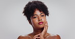 Face, makeup and black woman in studio, cosmetics and dermatology on white background. Space, foundation and person with confidence, shine and aesthetic with glow, skincare and beauty with wellness