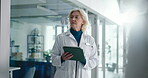 Thinking, woman and doctor with tablet, hospital or research for treatment plan, app and healthcare. Clinic, medical professional and mature person with tech for diagnosis, online and patient records