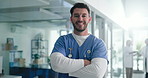 Happy man, face or professional nurse with confidence in hospital for health development or service. Portrait, male person or healthcare employee with smile or arms crossed for clinic assistance