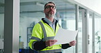 Businessman, architect or thinking with documents for construction planning or building maintenance. Man, contractor or inspection with blueprint layout for health and safety regulations in workplace