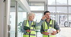 Building, civil engineer and people with tablet, talking and discussion for renovation and planning. Pointing, man and woman with project for property development, chat and teamwork for architecture