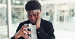 Black man, headache and water at office with stress, fatigue or drink with temple massage at company. African person, glass and migraine with pain, burnout and tired with tension at creative agency