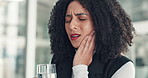 Business woman, pain and stress with toothache in office for strain, pressure or mouth infection. Frustrated, female person or sore jaw with water for dental injury, gingivitis or cavity in workplace