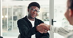 Business, man and interview with handshake in office for welcome, greeting and hiring employee. People, shaking hands and thank you for job opportunity, agreement and partnership for onboarding offer
