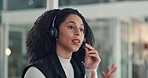 Black woman, consultant and talking with headset for virtual assistance or online advice in office. Female person, employee or African agent speaking with mic for remote web service in workplace