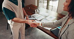 Meeting, people and handshake for greeting in office, collaboration or campaign results on document. High angle, brand manager and shaking hands with client for marketing strategy, deal and agreement