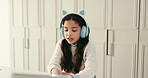 Girl child, headphones and talk with elearning at house for oral presentation, language or online assessment. Kid, tech and discussion with virtual class for education, development and home school