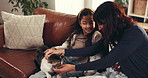 Mom, girl and cat with smile on couch, care and play with love, bonding or connection at home. People, mother and daughter in living room for pet animal, stroke and relax on sofa at family house