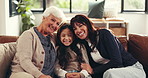 Face, grandma and mother with girl, love and bonding together with smile in living room. Home, generations and family on couch, laughing and care with humor, relax and parent with joke and comfort