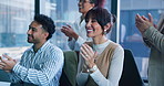 Woman, celebration and applause at meeting with team, goals or excited for profit announcement. Person, group and smile in crowd, success and motivation with cheers for revenue growth at media agency