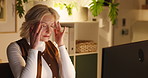 Business woman, computer and headache at night for overtime, article pressure and overworked. Journalist, tech and mature person with migraine at publishing agency for submission deadline and burnout