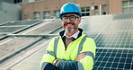 Face, solar engineer and happy man with arms crossed on roof in city for sustainable power. Smile, renewable energy and mature photovoltaic inspector with confidence, laugh and eco friendly portrait