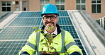 Face, solar panel engineer and happy man with plant on roof in city for sustainable power. Smile, renewable energy and mature photovoltaic inspector with confidence, laugh and eco friendly portrait