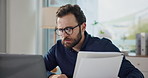 Business, thinking and man with laptop, documents and online reading with checklist. Person, employee and consultant in workplace, computer and email with paperwork, report and schedule with internet